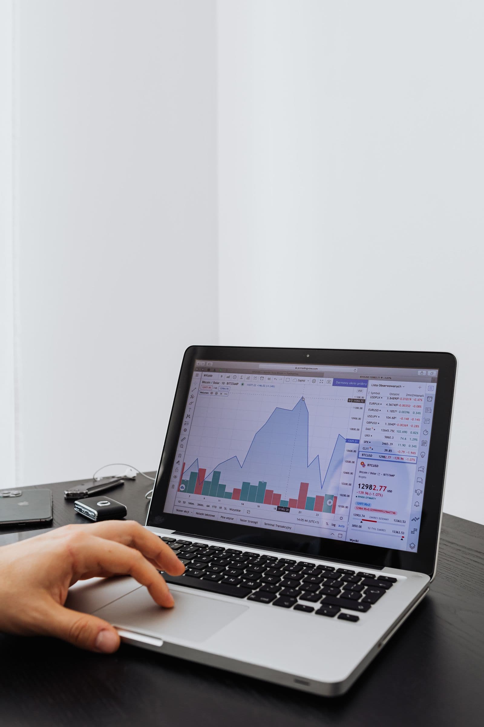 Analyst reviewing paid ad campaign metrics on a screen