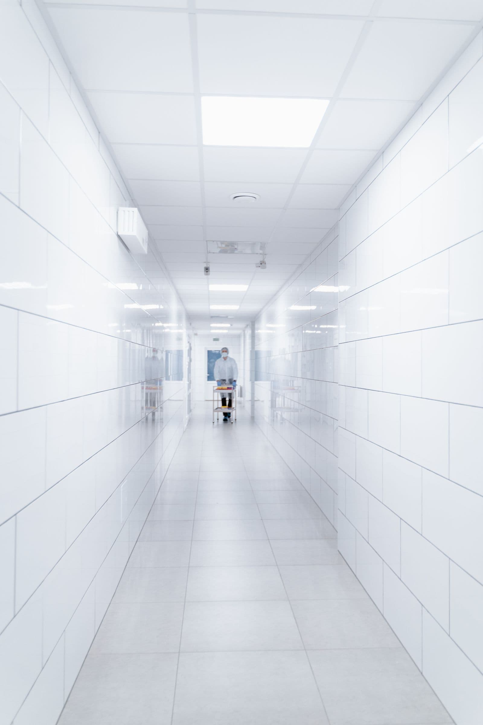 Healthcare administrator reviewing patient billing records on a computer