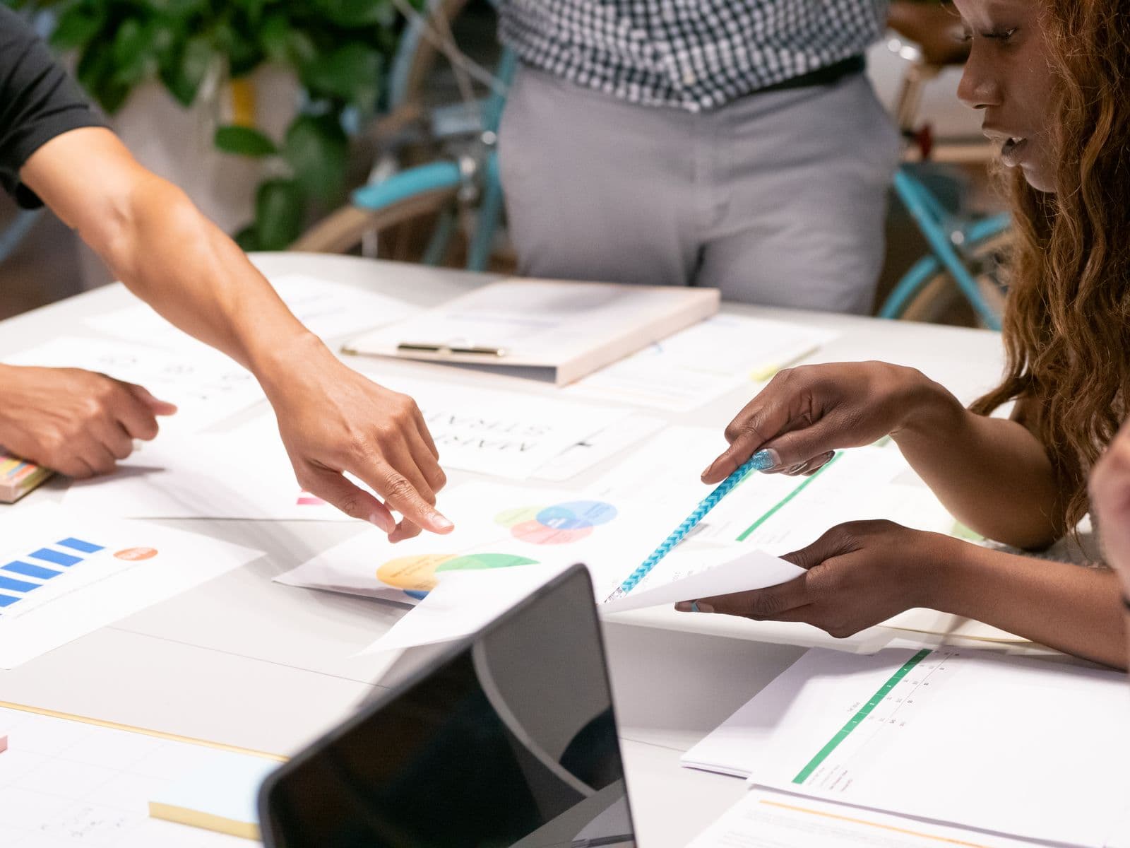 Marketing team reviewing campaign performance on a dashboard