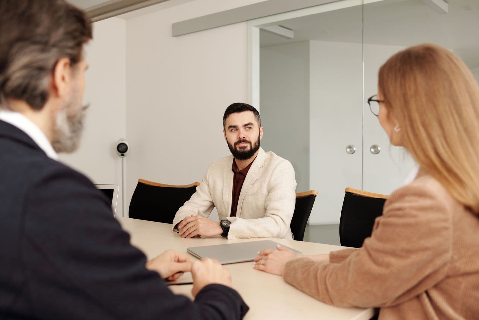 HR team meeting to discuss employee benefits enrollment