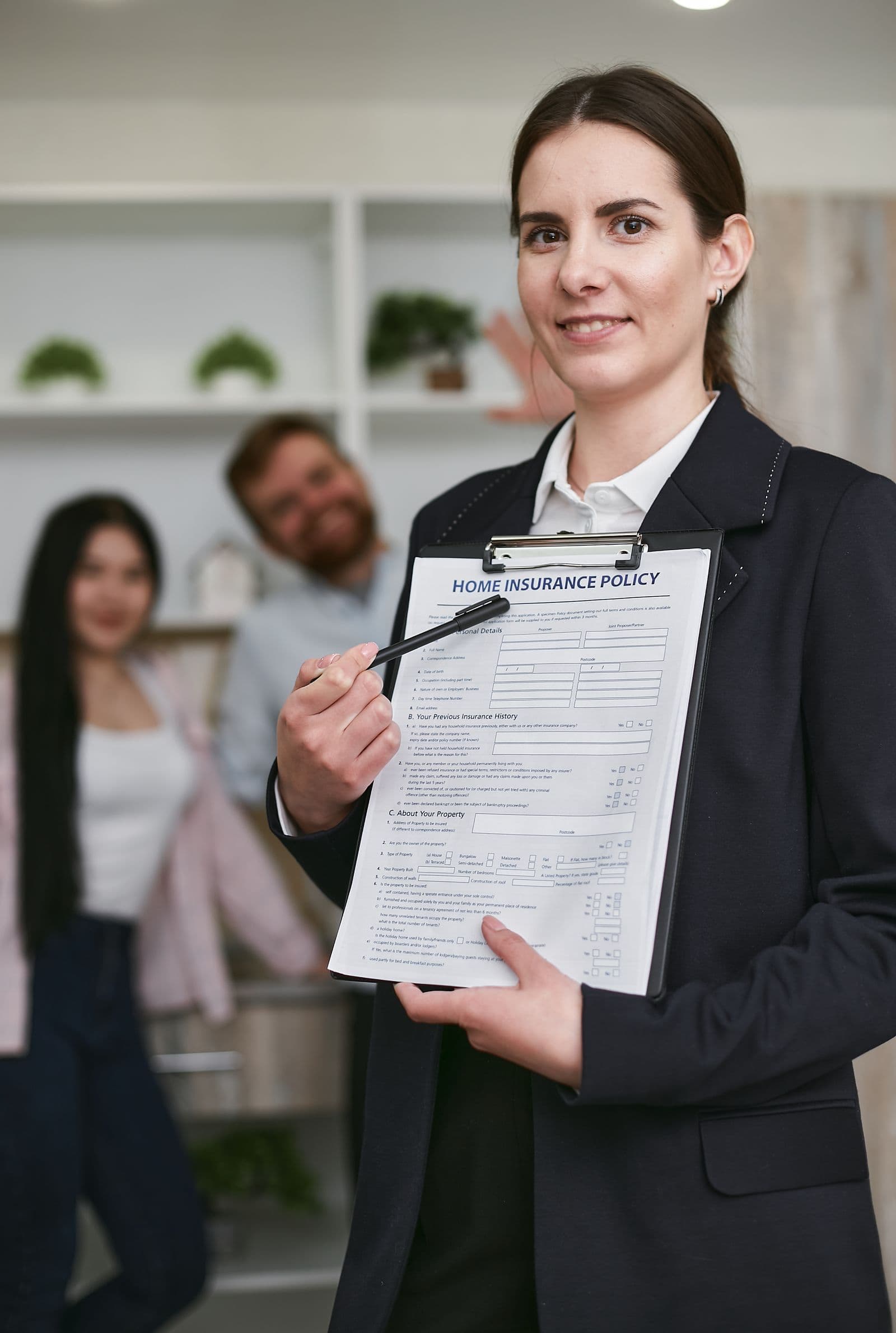 Insurance specialist presenting a policy to a client